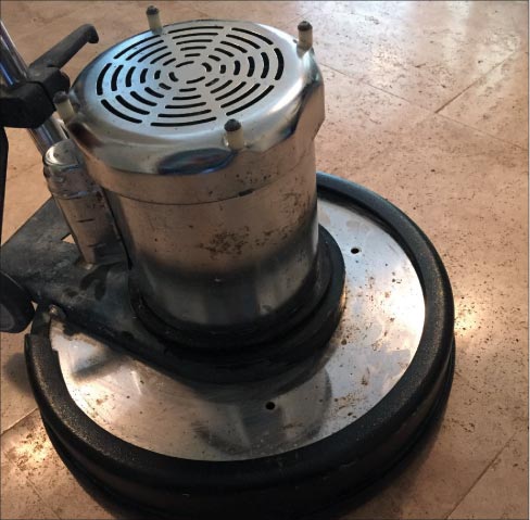 Use a splash guard on your floor machine to eliminate splatter on adjacent vertical surfaces. I also recommend doing a hot water rinse and buffing with a white pad to eliminate salt film residue.