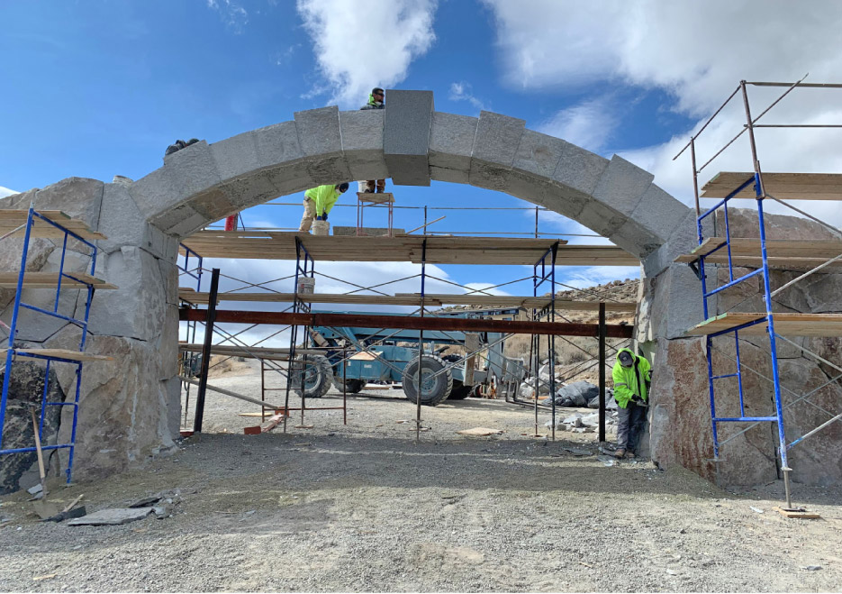With the keystone in place, the major work on the arch is almost complete. Finishing touches include hardscaping and placing  two 40,000 lb. andesite boulders with inset plaques, which inform visitors and dedicate the arch site.
