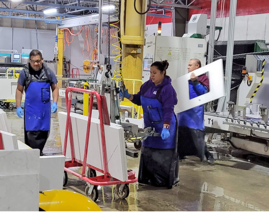 Each piece of equipment in the shop is served by a crane to easily and safely deliver materials.