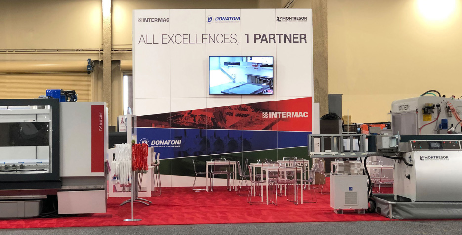 The Intermac booth at 2020 StonExpo showcased several machines and new technology like the EasySTONE CAD program and the SOPHIA IoT platform.