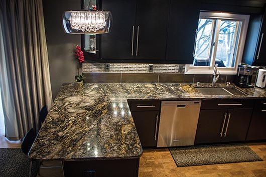 Brown’s client, Mrs. Shaffer, chose placement of the cuts and movement in the granite according to how the lights would hit it. The Shaffers love the shine and color of the Cianitus, which can be very difficult to work with because of its softness and high quartz composition.