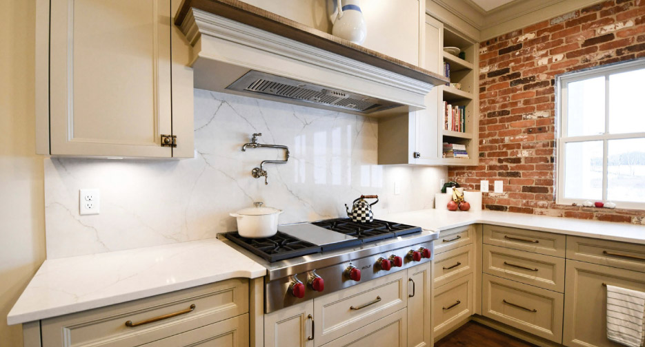 Porcelain kitchen with full-height splash. 
