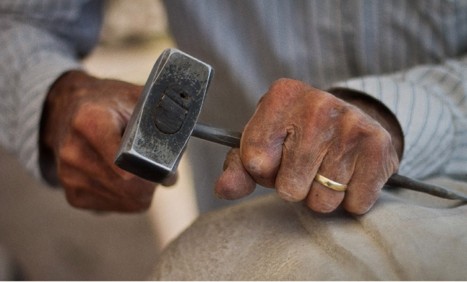 The hands of 40 years of stone carving experience. For the past 22 years, the Saxe Stone Carving Symposium has helped to keep the art of stone carving alive.