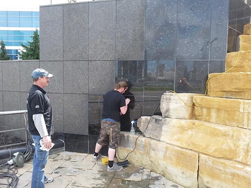 It’s all in the details: The “Jedi” polishing a granite wall while Moses examines the details that make for a perfect job and a happy client. While Moses is responsible for the finished product, it takes an experienced, fast-working “Bull” on the team to produce timely results. Together, it’s a combination that makes a job profitable.