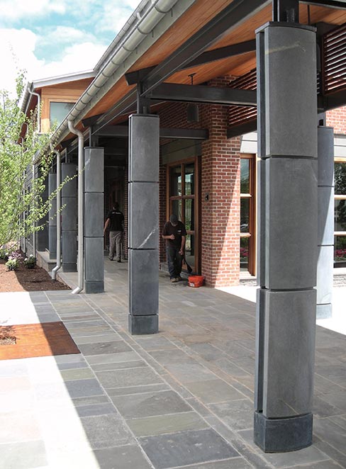 The choice of polished or honed finish – honed American Original is used on the colonnade outside the Jefferson Scholar’s Building, UVa,  is available for most varieties of Alberene Soapstone Company products.