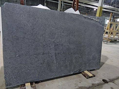 American Original soapstone slab from the Old Dominion quarry, shown installed with a honed surface in the kitchen below, right.
