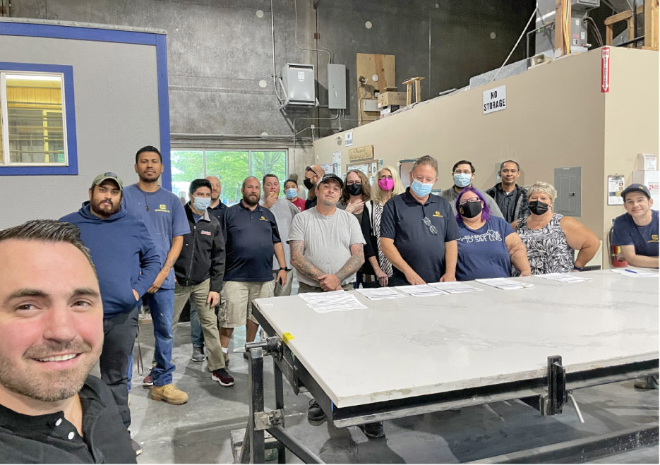 Dan Izoita and part of the fabrication and office crew at Crowley’s Granite.