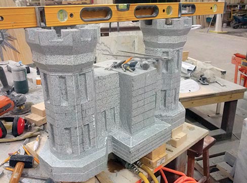 The Elberton Blue granite castle under construction. “The castle is the symbol of the Army Corps of Engineers, which the Marines adopted many years ago The Marine Corps mounted the EGA to the front of it to show that it is the Marine Corps version of it, obviously,” said Stan.