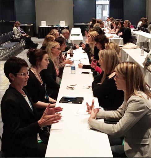 Spanier (left, foreground) helped develop and implement the Women In Stone Mentorship program.