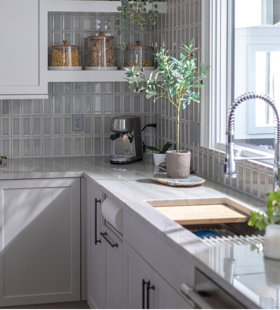 This Brownstone project with Stoneledge Properties features Sea Pearl polished quartzite tops with HGI cabinetry. 