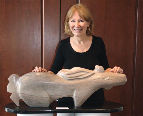 The recently completed “Chase” is thirty-six inches long, carved and polished Tennessee Gray marble.