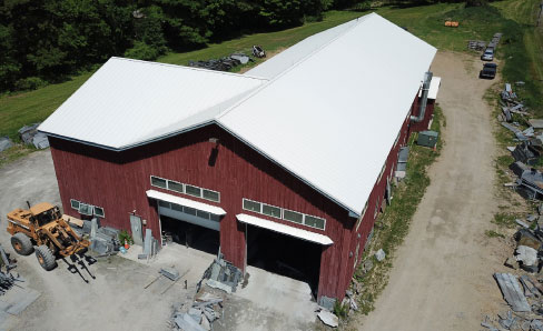 Ashfield Stone’s 8,500 square foot shop is built on ten acres, and updated six years ago when the Pratts needed more production space. Heat for the building is from an outdoor, wood-burning furnace and fed with local wood, most likely logged by Jerry Pratt. 