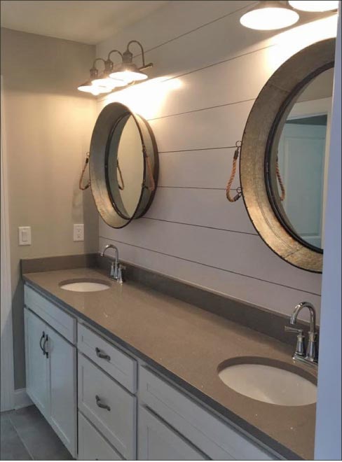 3cm Stellar Grey quartz vanity with undermount sinks.