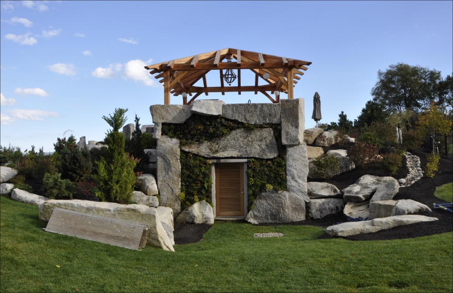 Monolithic construction and landscaping, this bunker for a pool and hot tub in Cape Elizabeth, Maine is made of local granite and was quite a challenge for Dan and crew. Photo: Jill T. Greenlaw