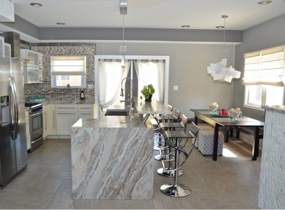 Kitchen material, perimeter: Blue Fantasy marble with eased edges. Kitchen 