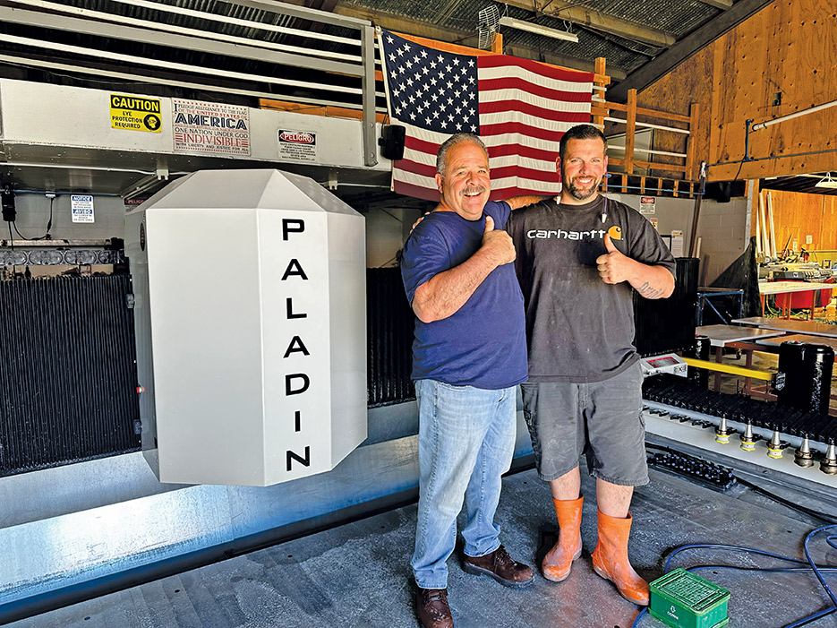 From Left: Gino Scolari, owner of Scolari Marble & Granite, and Gino Scolari Jr., proudly pose with their first-ever CNC stone router. Their shop has made the transition from hand fabrication to automation with the PALADIN. 