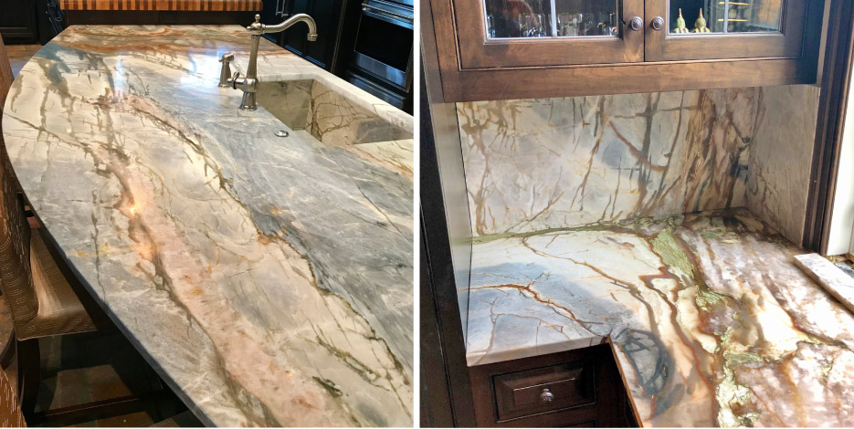This marble kitchen features a full-height backsplash and a matching, built-in undermount marble sink.