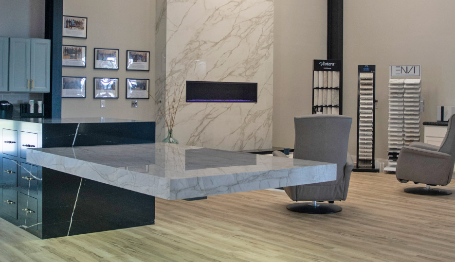 an ingenious cantilevered floating island, also in mitered quartzite