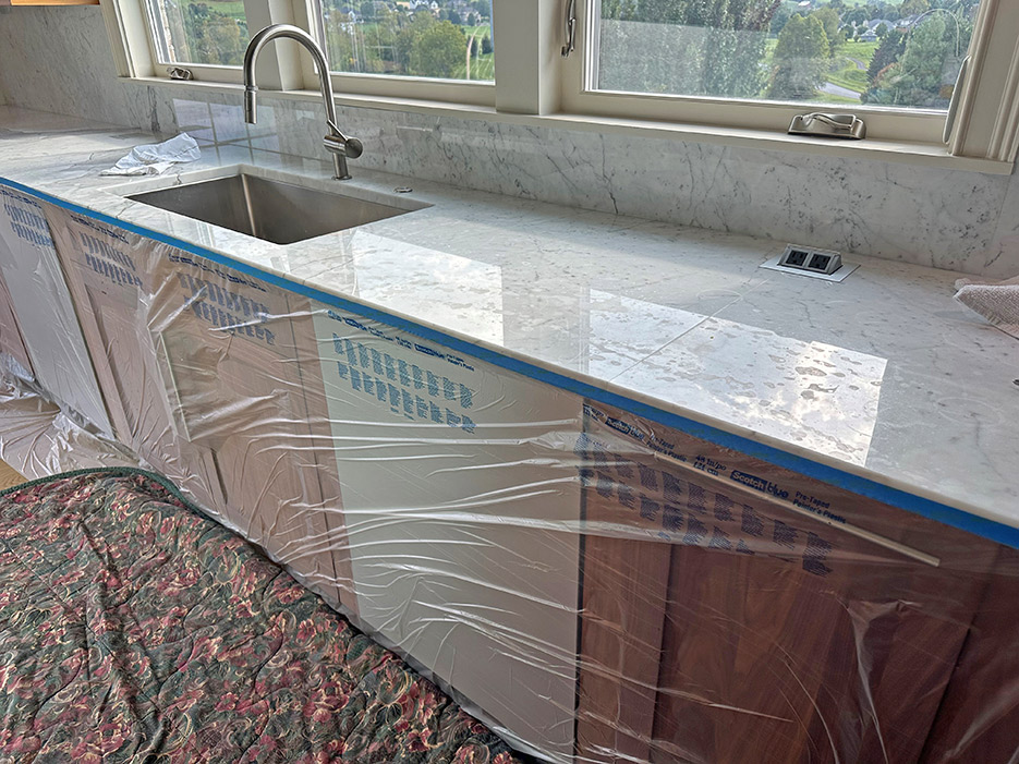 Deep scratching staining and wear on the countertop. The previous owners obviously did not believe in cutting boards!! LOL!