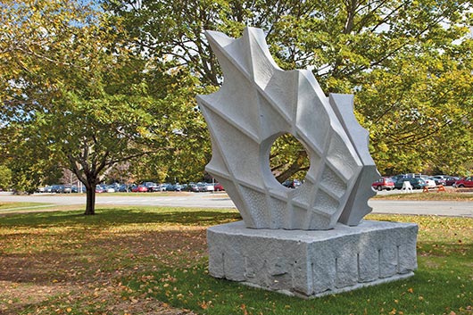 Sculpted with great energy and attention to textural details, South Korean artist Lee Zih-Cing’s “Metamorphosis” offers tranquility in a surround of autumn colors at its site on the University of Maine’s “Hill Top.”