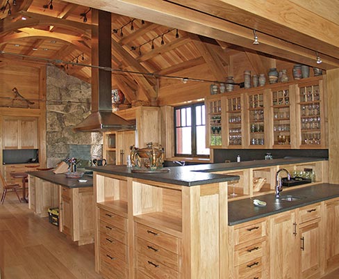 Antique finished 3cm Absolute Black granite countertops were the perfect choice to complement this rustic kitchen in northern Maine.